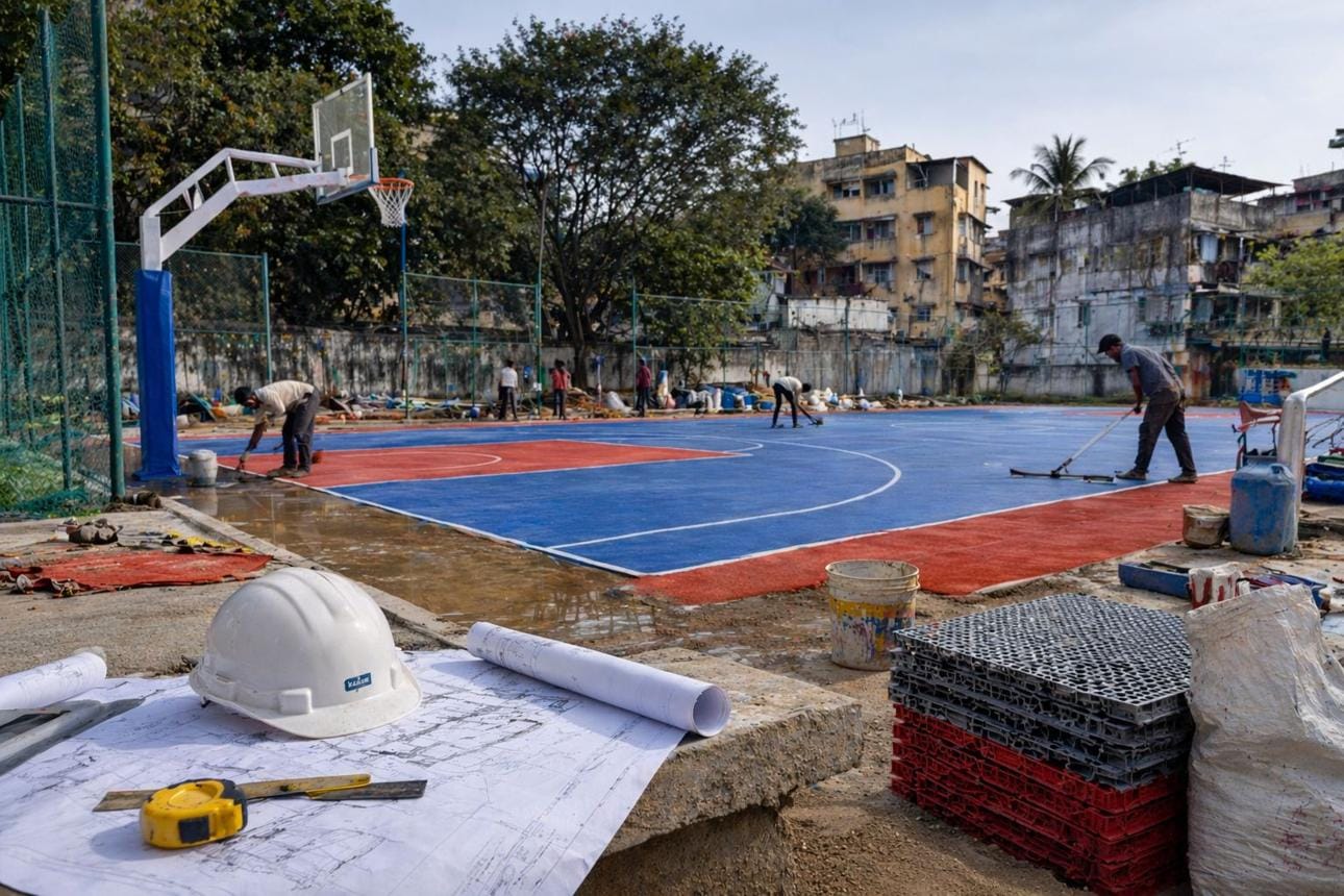 Leveling concrete base for sports arena
